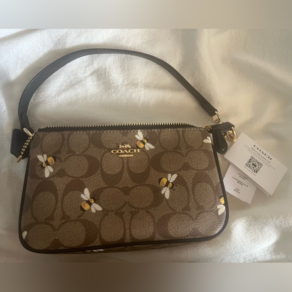 Handbags - COACH Nolita 19 ln Signature Canvas Bee Print. NWT.  L: 7.5" H: 4.5" W: 2.0"